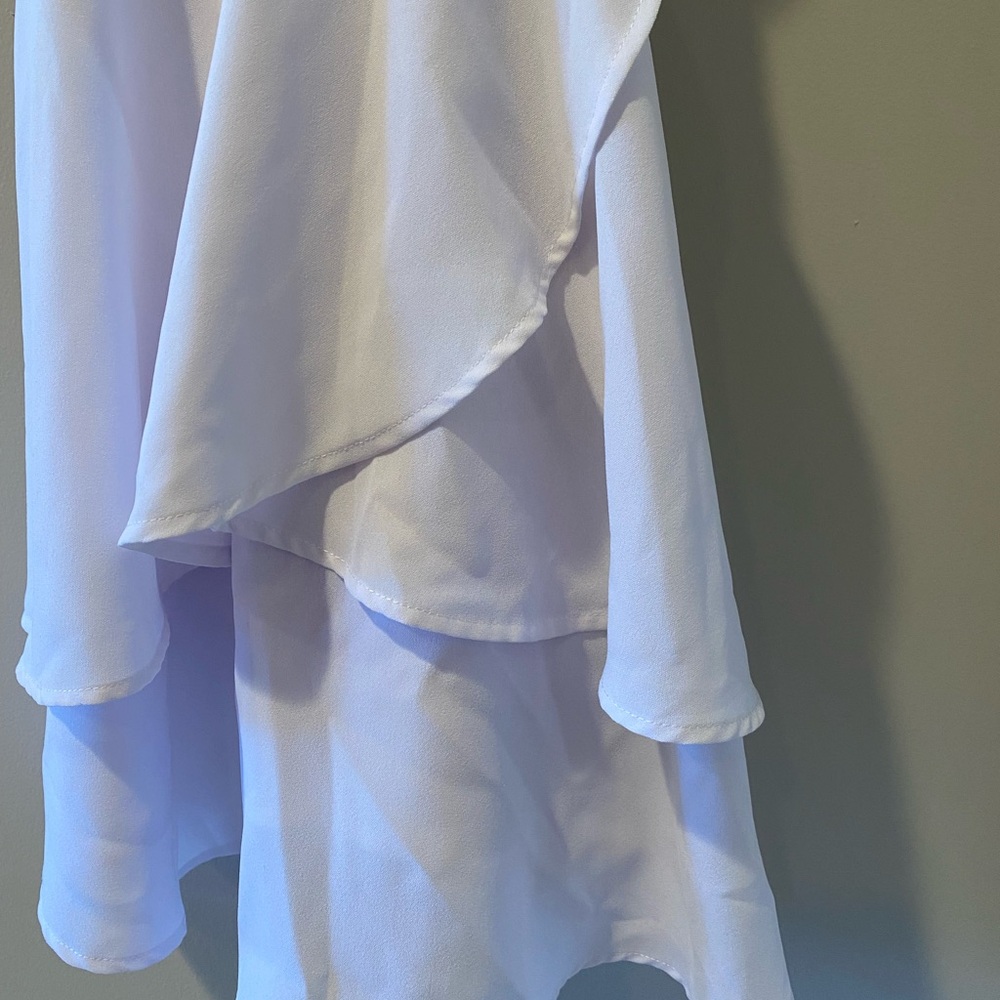 Elegant White Sleeveless Dress - Picture 5 of 5